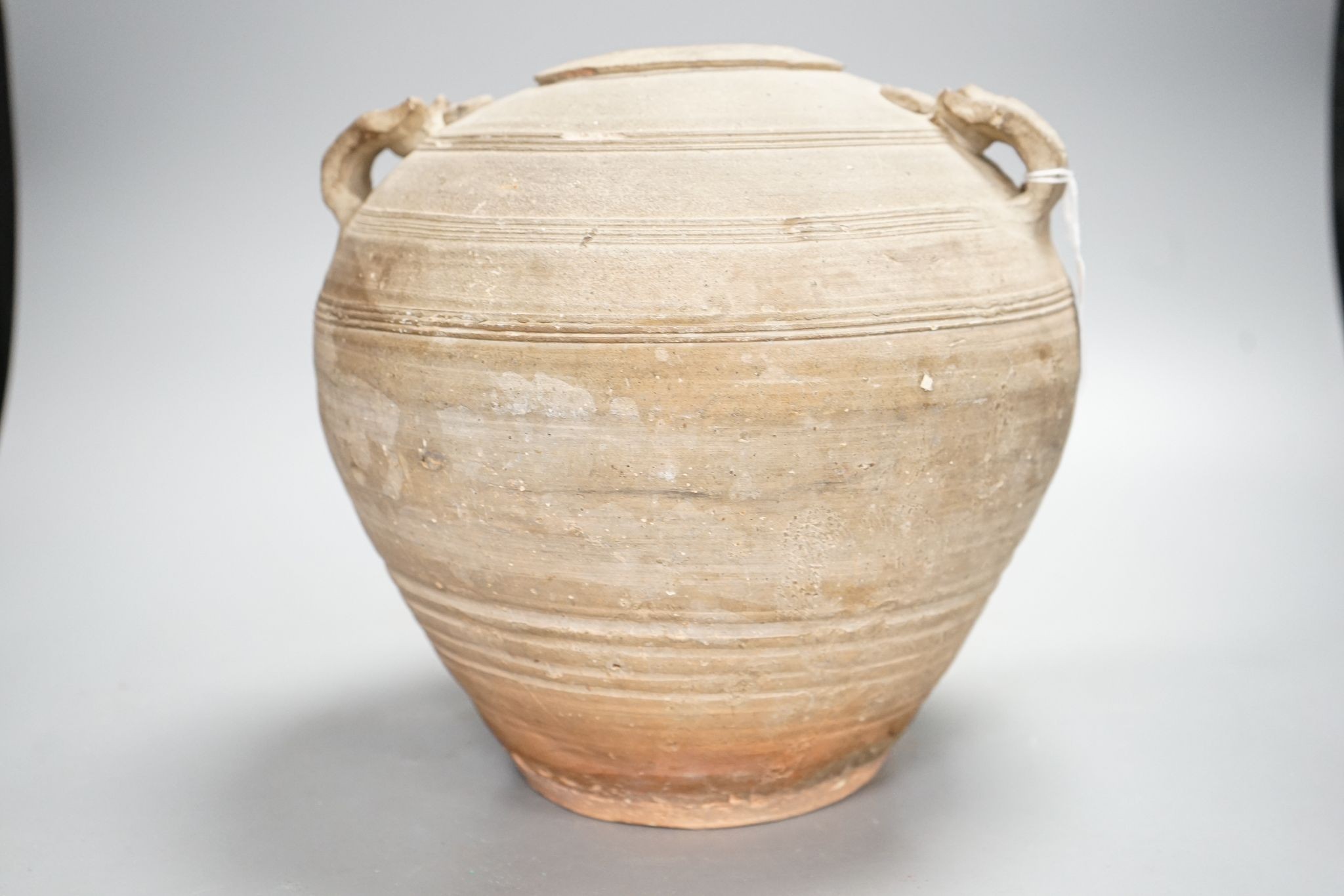 A Chinese Warring States pottery jar, 24cm